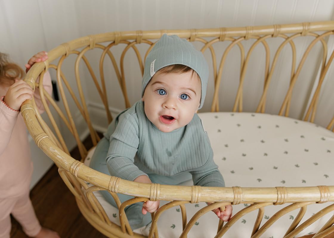 Sage Vintage Leaf pattern on Ely's & Co bassinet sheets enhances nursery decor