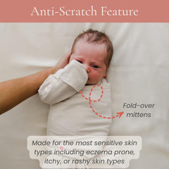 embé hip healthy swaddle leg pouch supports comfortable hip positioning.