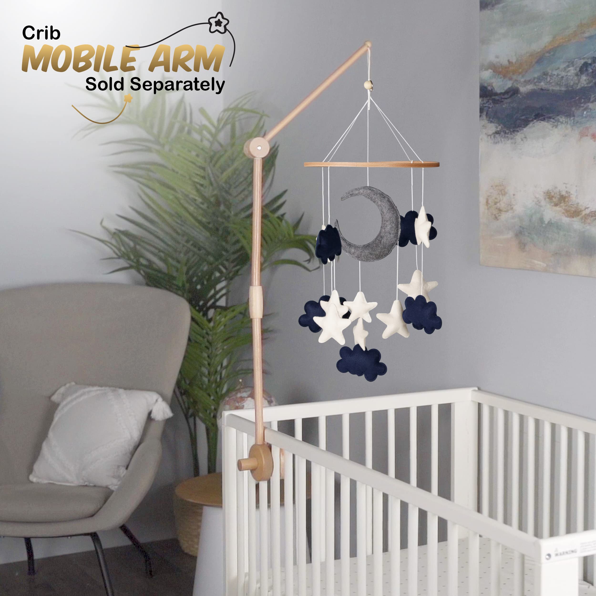 EMMNNIC baby-mobile white clouds visuals create a serene crib focal point.