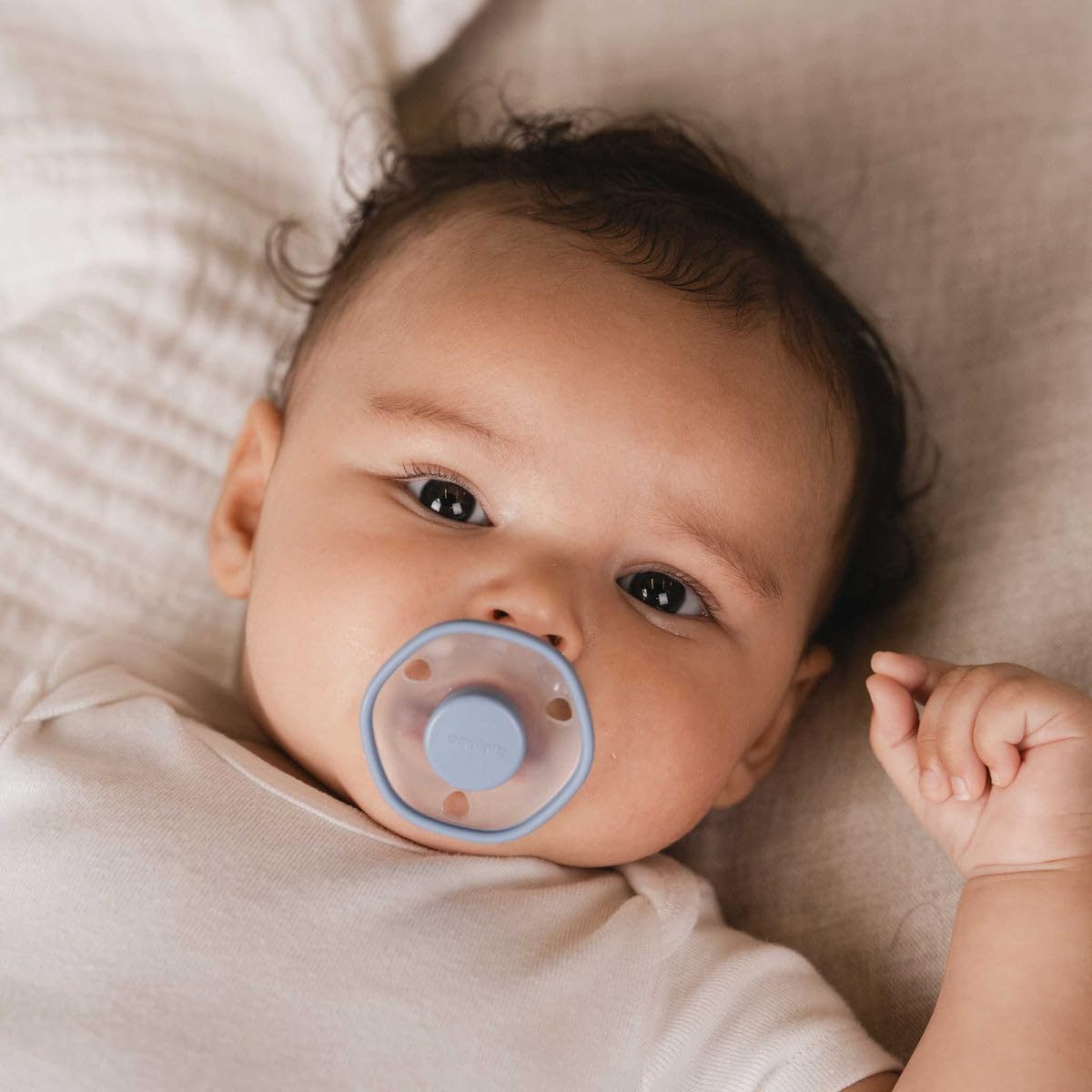 Emulait baby pacifier BPA-free-silicone closeup stresses safety and easy cleaning.