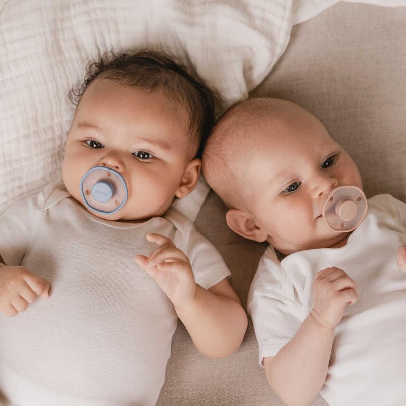Emulait baby pacifier microwave-dishwasher-safe closeup demonstrates convenient sanitization.