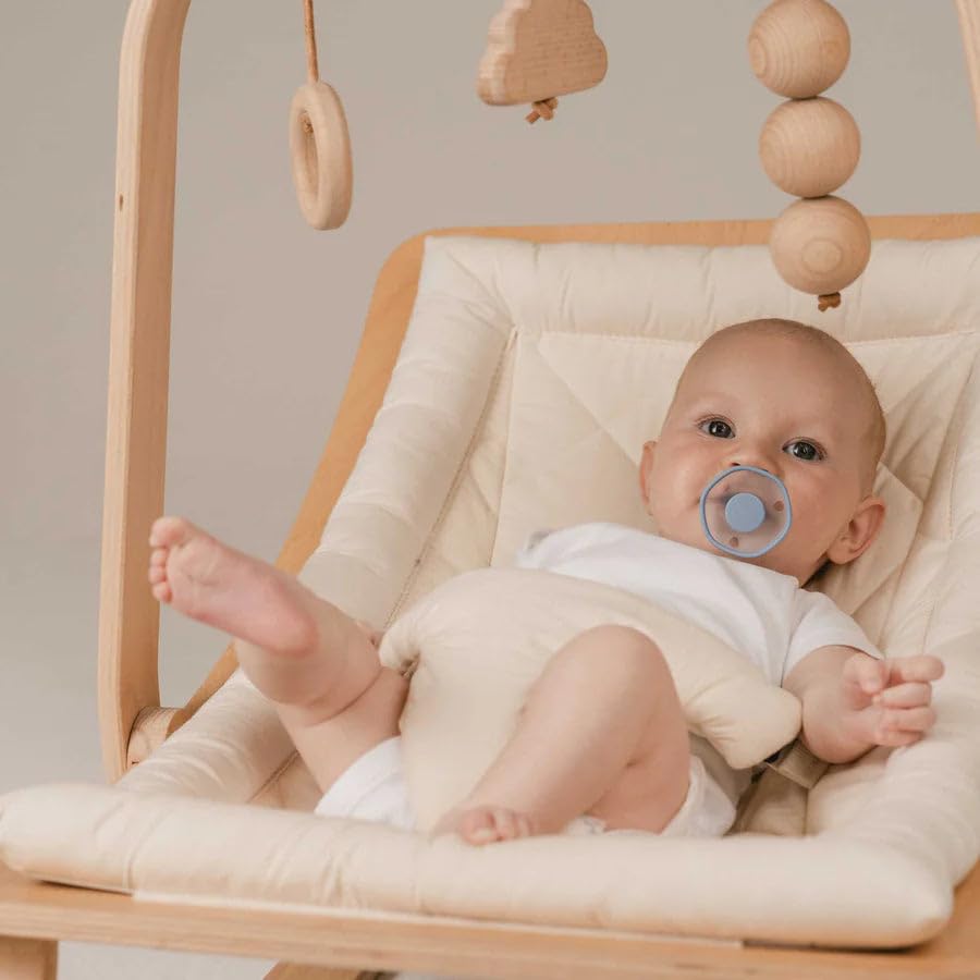 Emulait baby pacifier ventilation-holes closeup promotes gentle airflow and skin comfort.