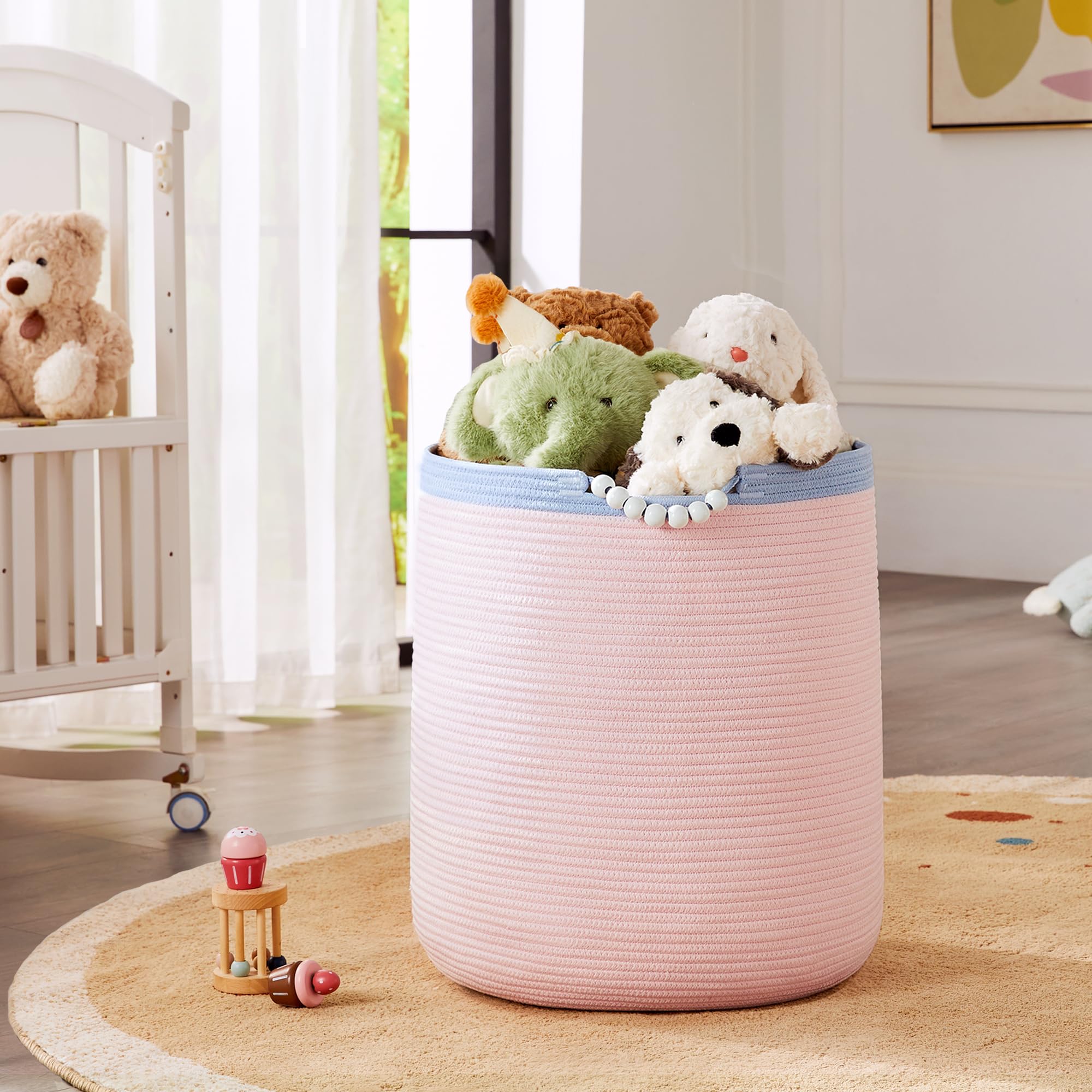 ENAORGAN 65L pink woven rope hamper, front view, spacious storage for laundry.