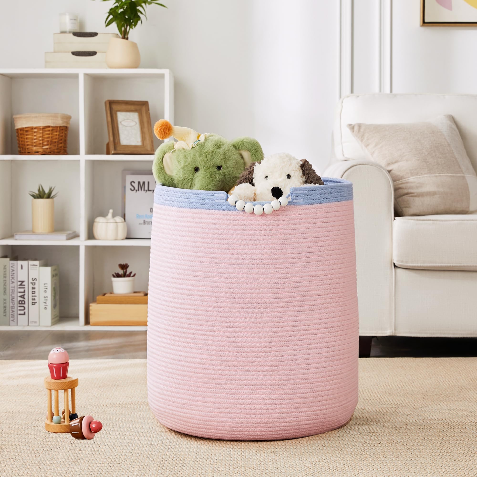 ENAORGAN pink nursery decor with hamper, stylish storage for blankets and toys.