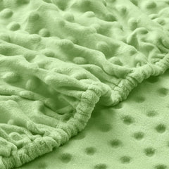 Entisn oval bassinet fit sheet demonstrates snug non-slip design.