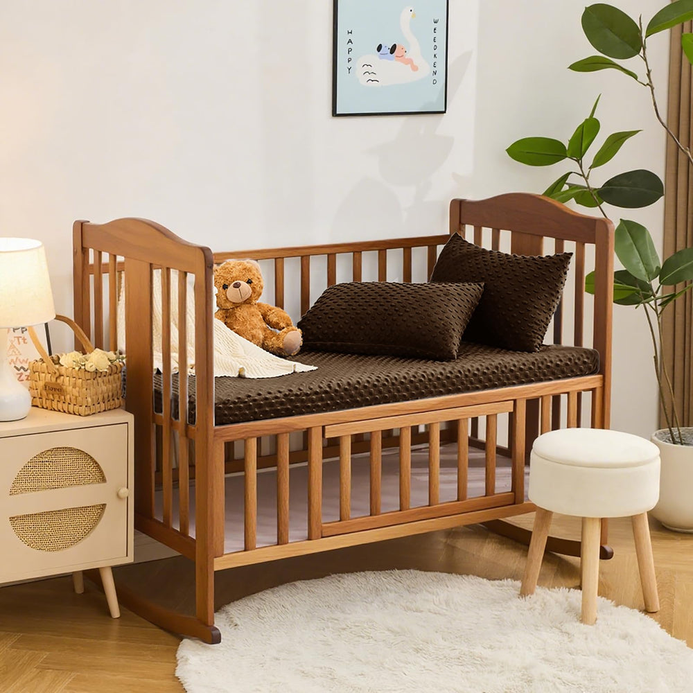 Entisn crib sheet variant in chocolate brown blends with nursery decor