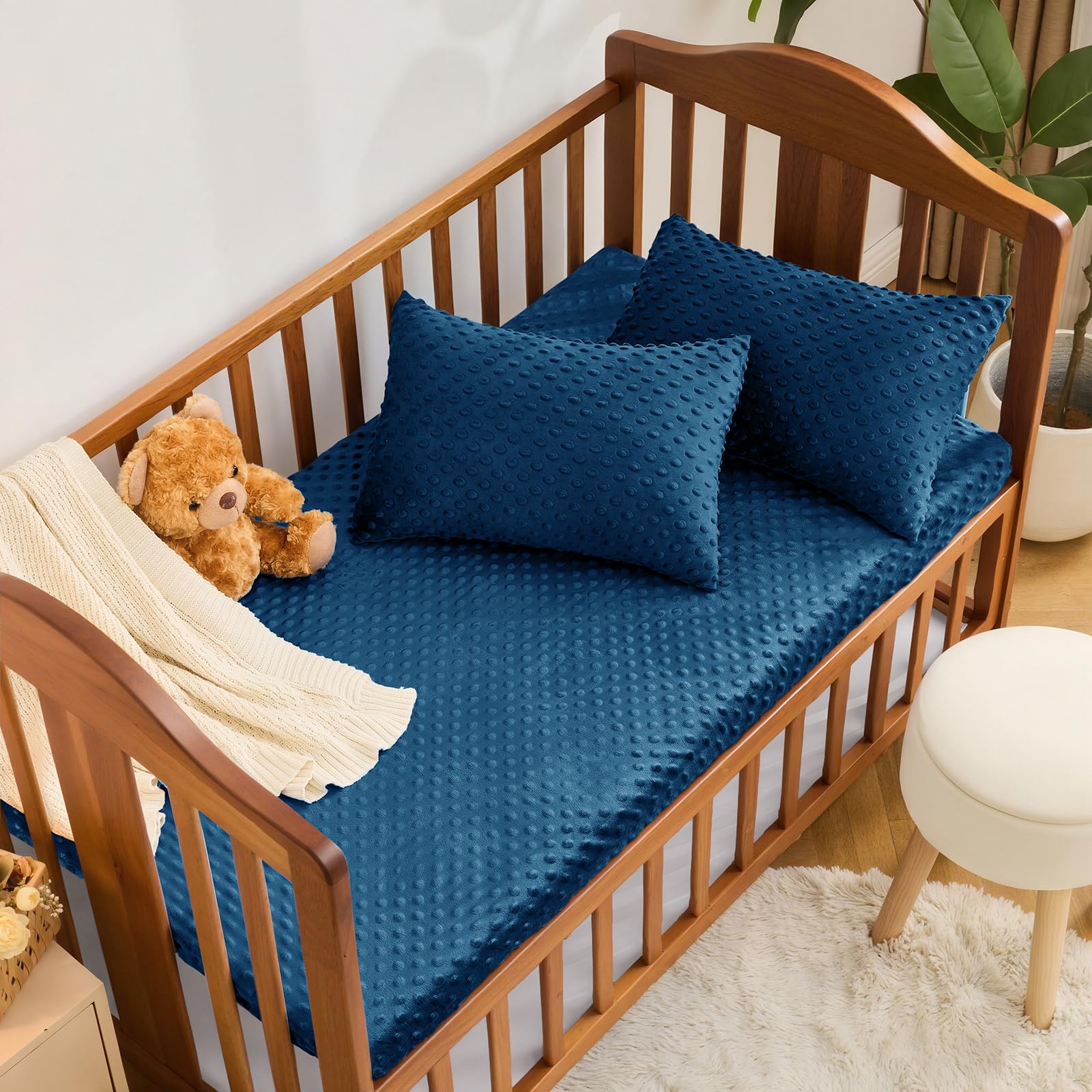 Entisn Minky Dot fabric close-up shows soft, cozy texture for peaceful naps.