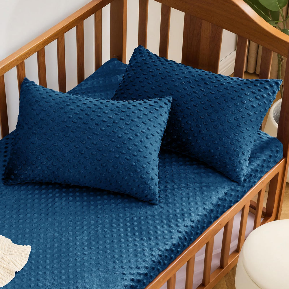 Entisn nursery bedtime setup with pillowcase fitting crib or stroller