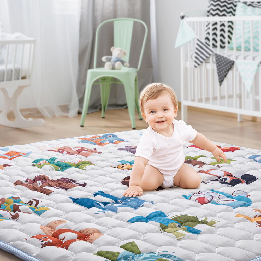 ENVTEK baby play mat in a living room setup with a toddler at play.