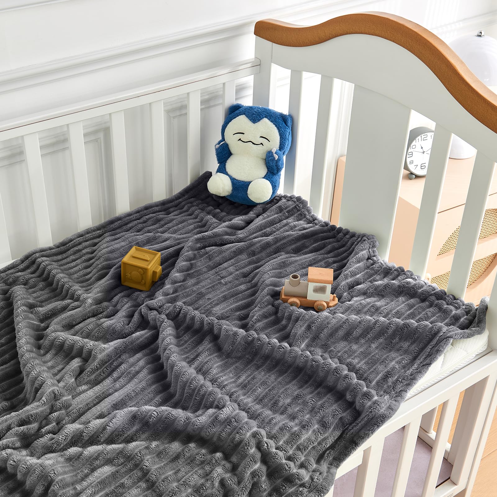 Eonkasp striped reversible blanket gray displayed for crib or stroller use