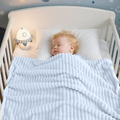 Close-up of Eonkasp ultra-soft microfiber texture against baby skin.