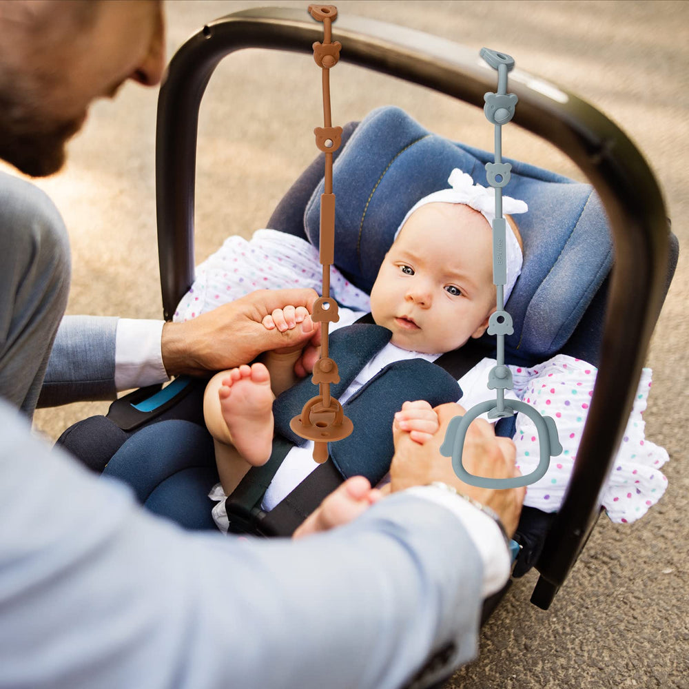 Eoopoon stroller and high chair attachment reduces dropped toys.