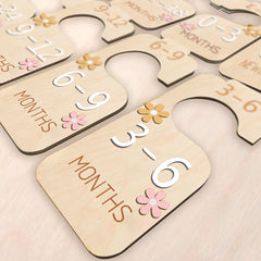 eoscasely eight sizes labeled dividers for newborn to 24 months keep clothes organized.