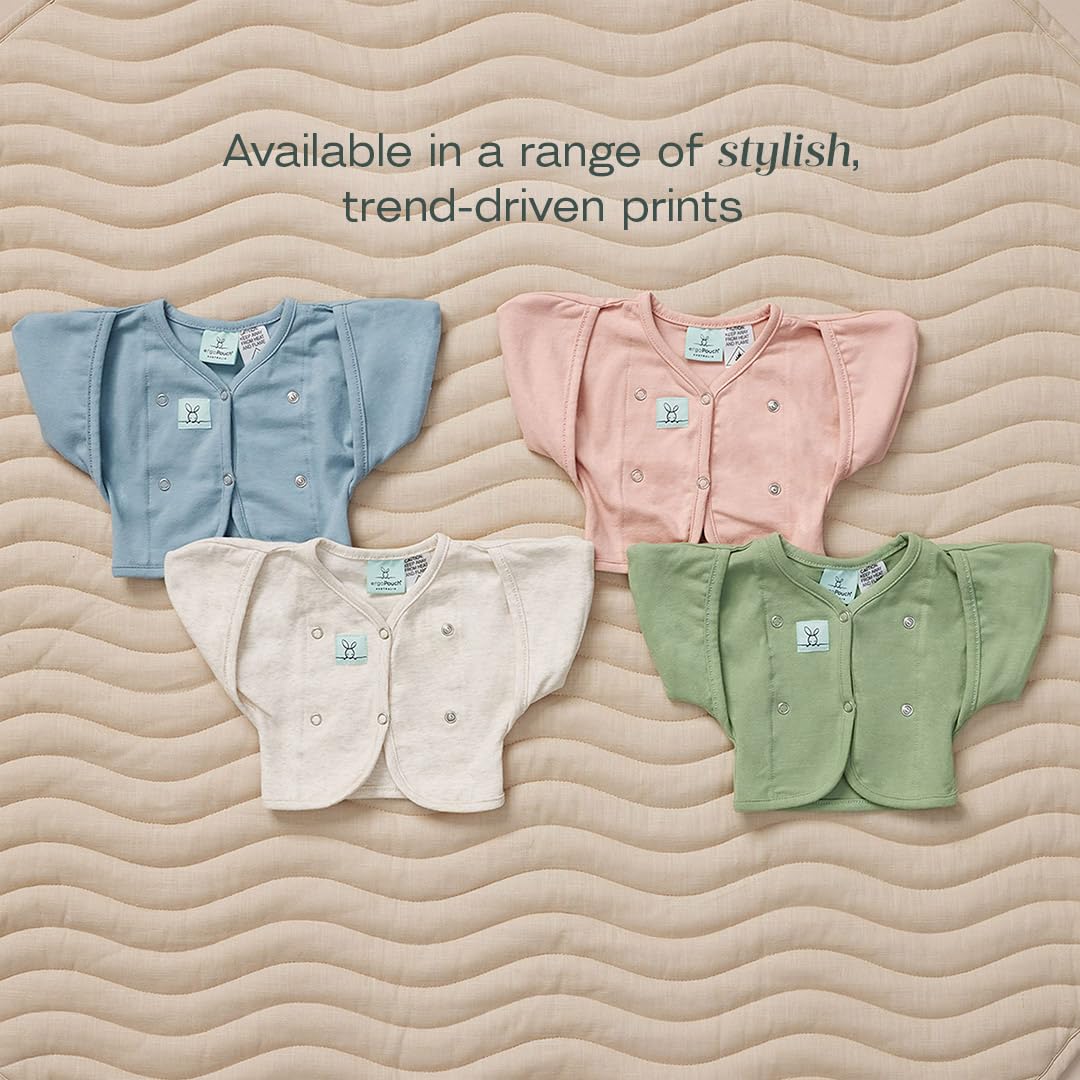 ergoPouch Butterfly Cardi worn over a swaddle for safe cozy warmth.