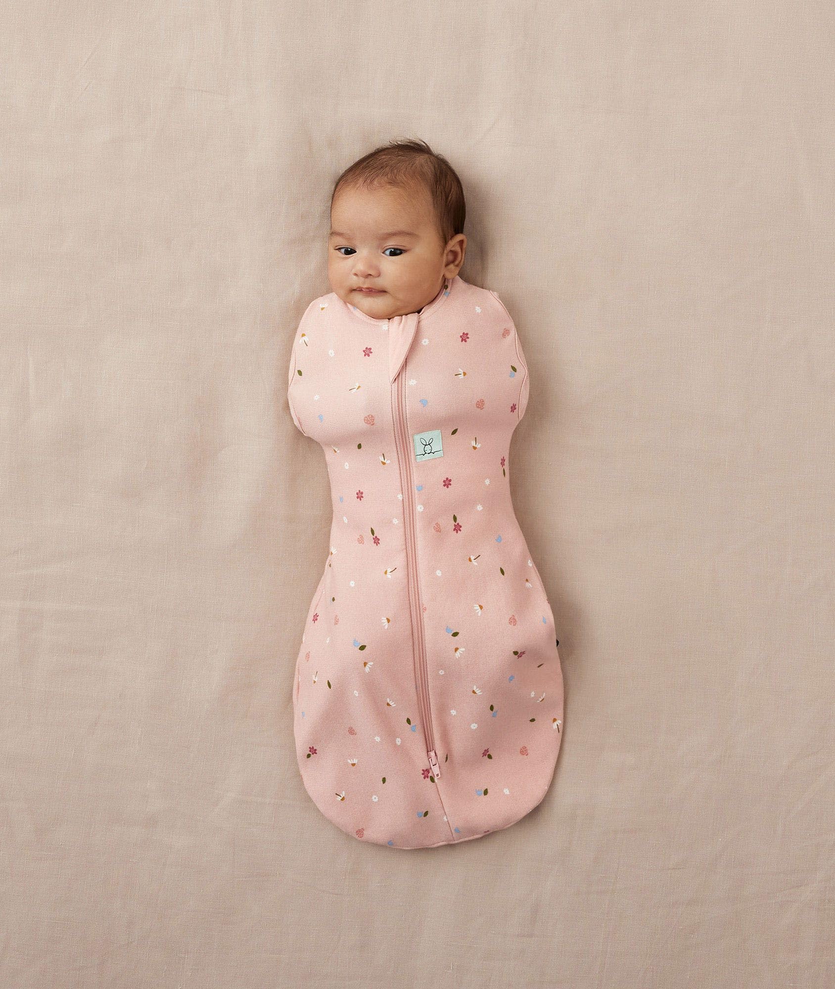 ergoPouch Cocoon Swaddle Sack arms-out-shoulder-snaps supports flexible sleep as baby grows