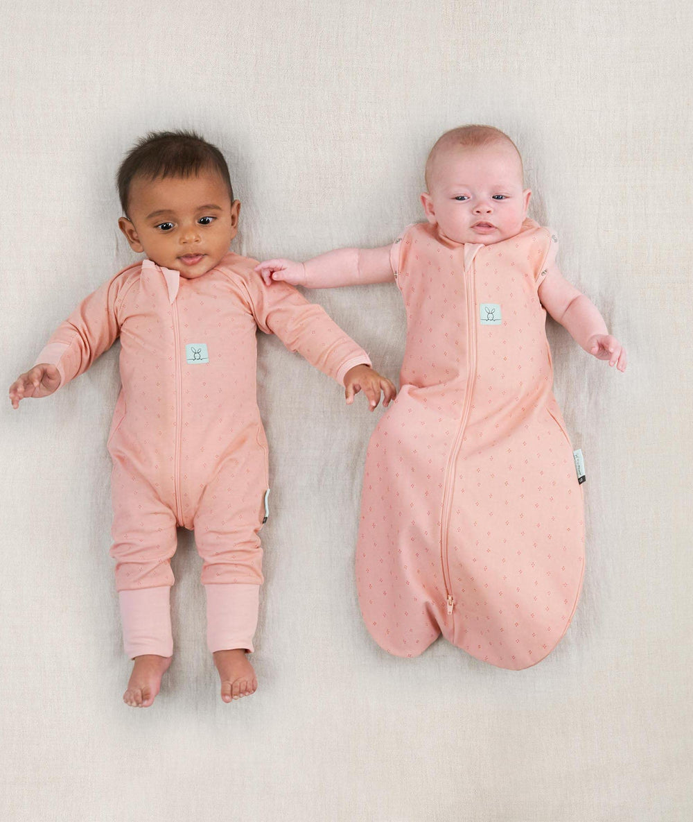 ergoPouch Cocoon Swaddle Sack 0.2 TOG berries, arms-out option for easy diaper changes.