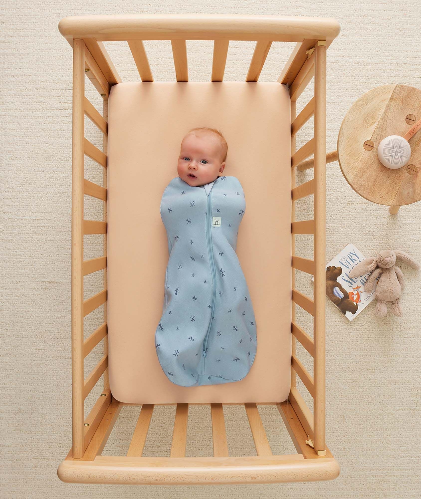 ergoPouch Cocoon Swaddle Sack dragonflies side view supports arms-in to arms-out flexibility