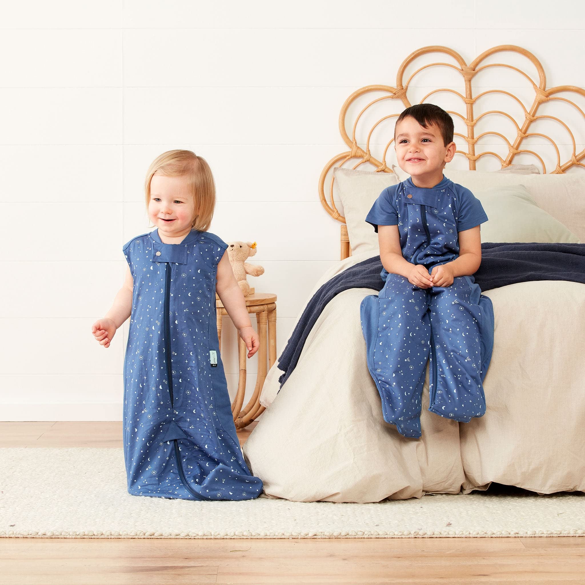 ergoPouch Sleep Suit Bag Night Sky worn by baby demonstrates secure sleep comfort.