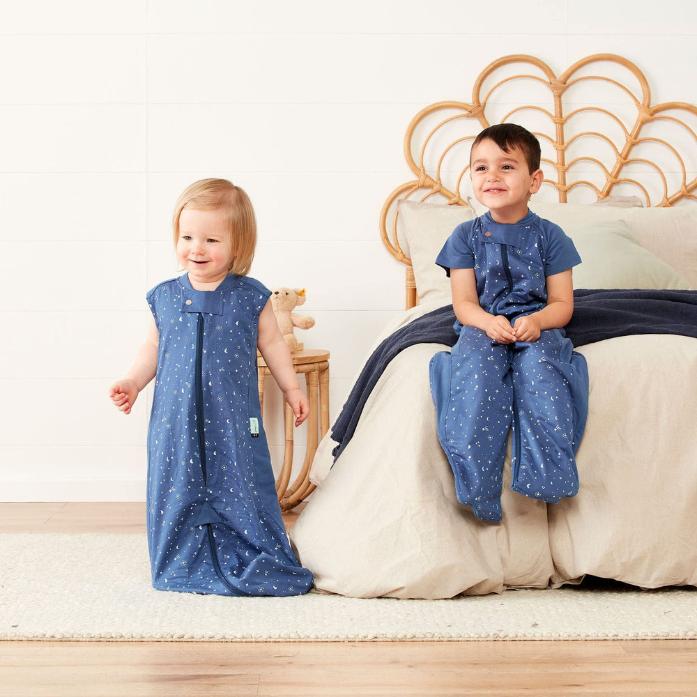 ergoPouch Sleep Suit Bag Night Sky worn by baby demonstrates secure sleep comfort.
