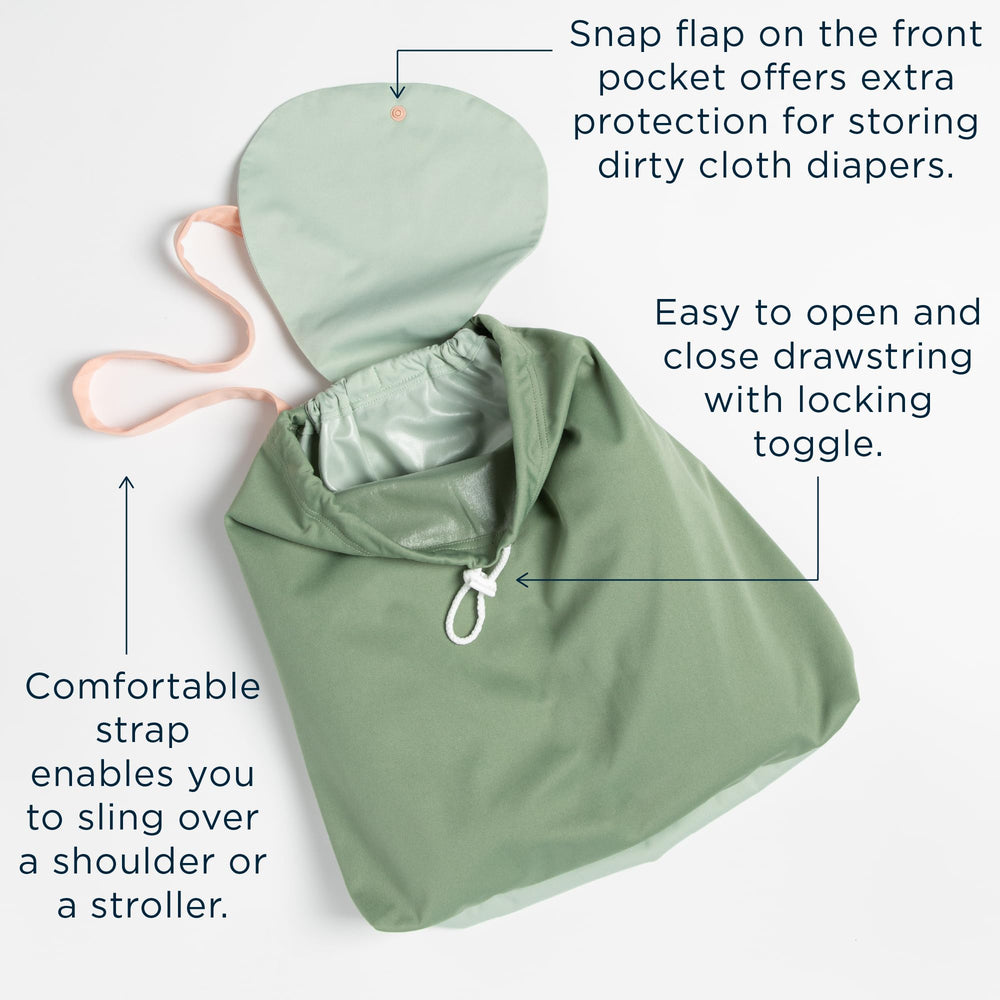 Esembly Day Bag waterproof back pocket keeps clothes dry on rainy days.