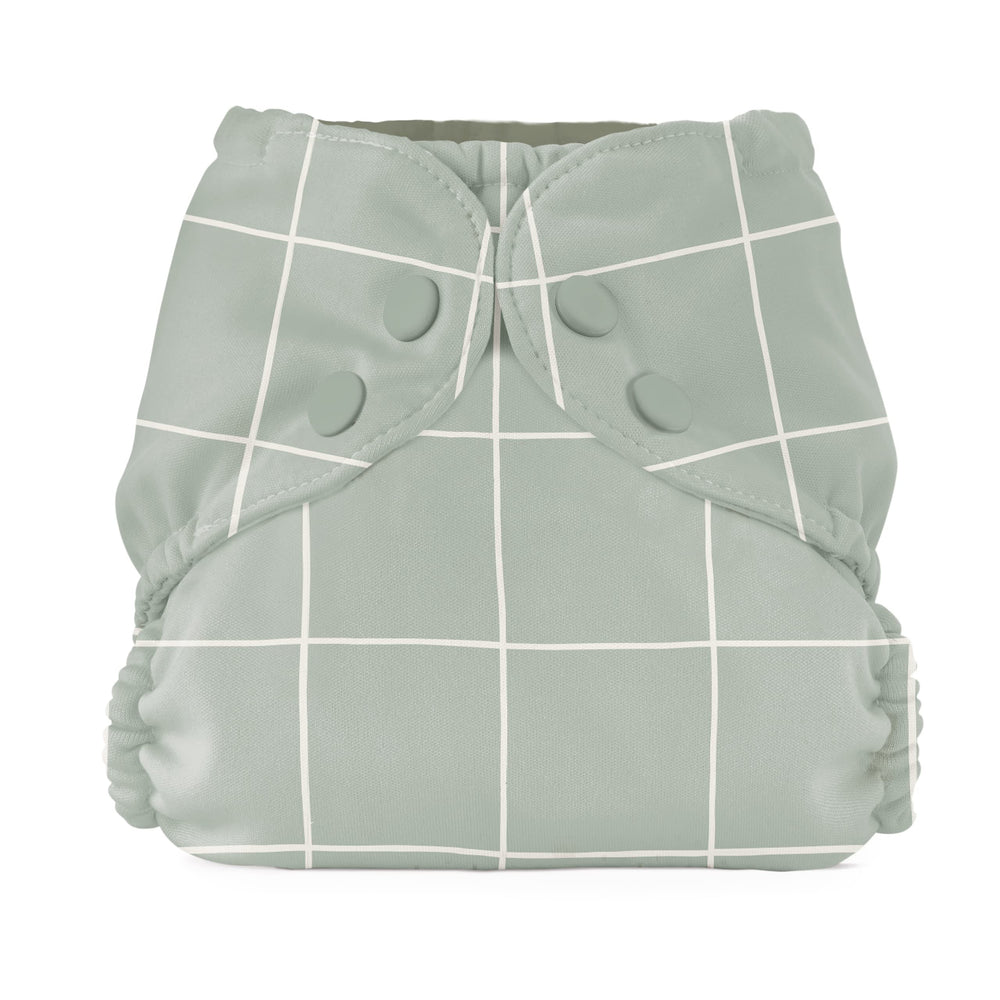 Esembly lattice outer front view demonstrating blowout protection and snug fit with adjustable snaps.
