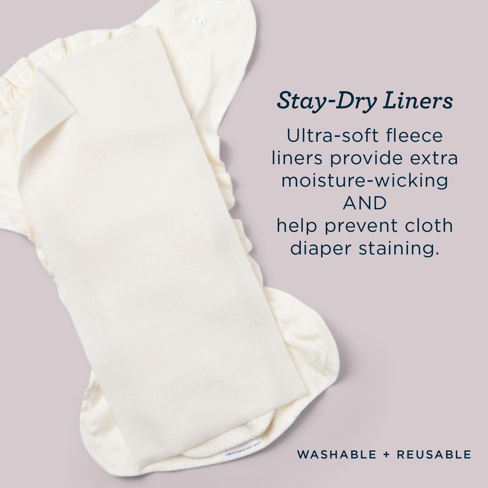 Esembly Stay-Dry liner being washed with diapers on laundry day.