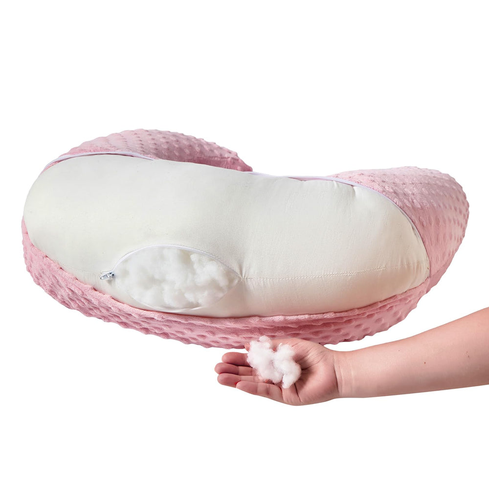 ESEN nursing pillow supports height and positioning during bottle feeding.