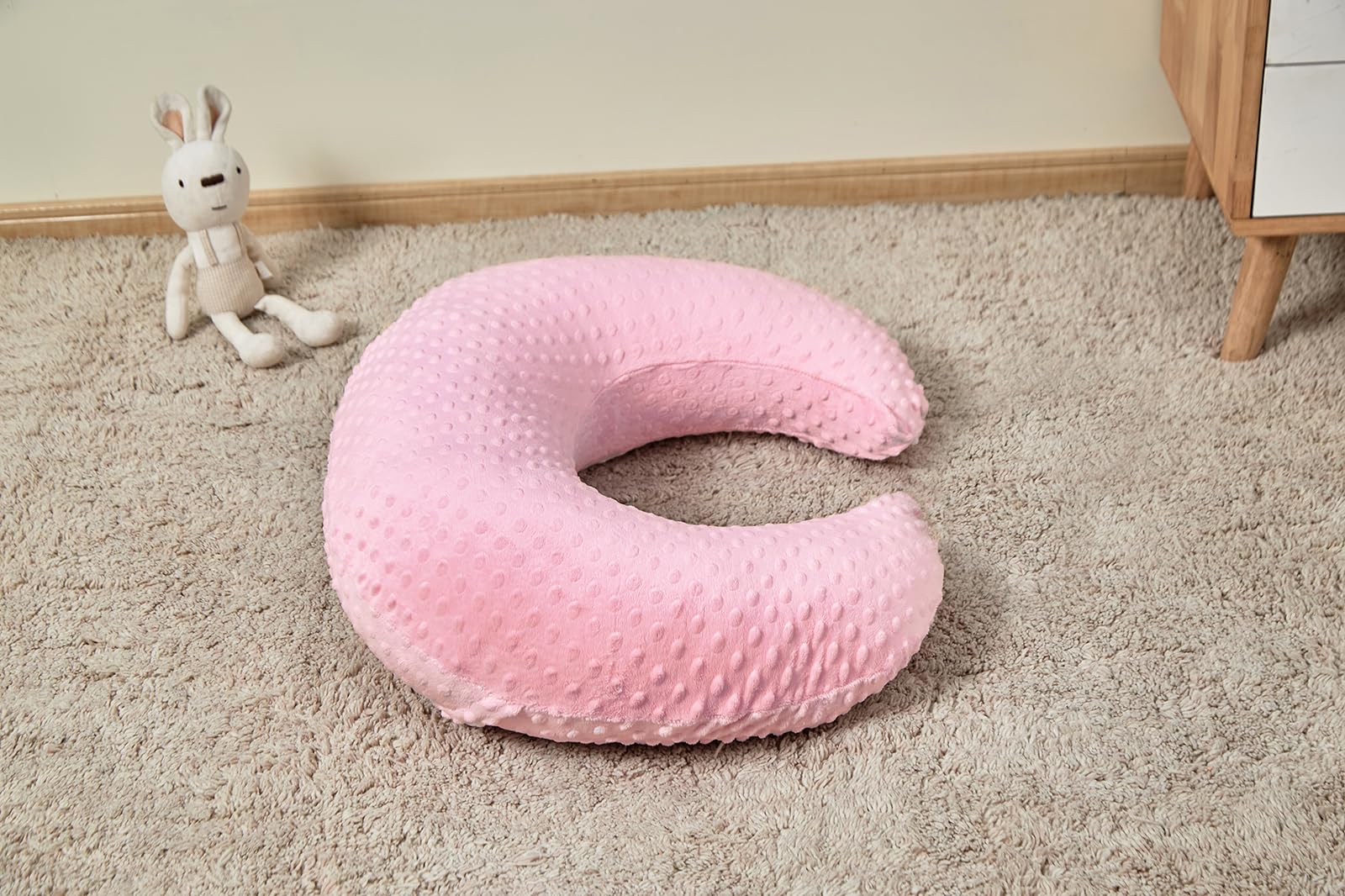 ESEN nursing pillow ships vacuum-packaged and puffs up to full size.