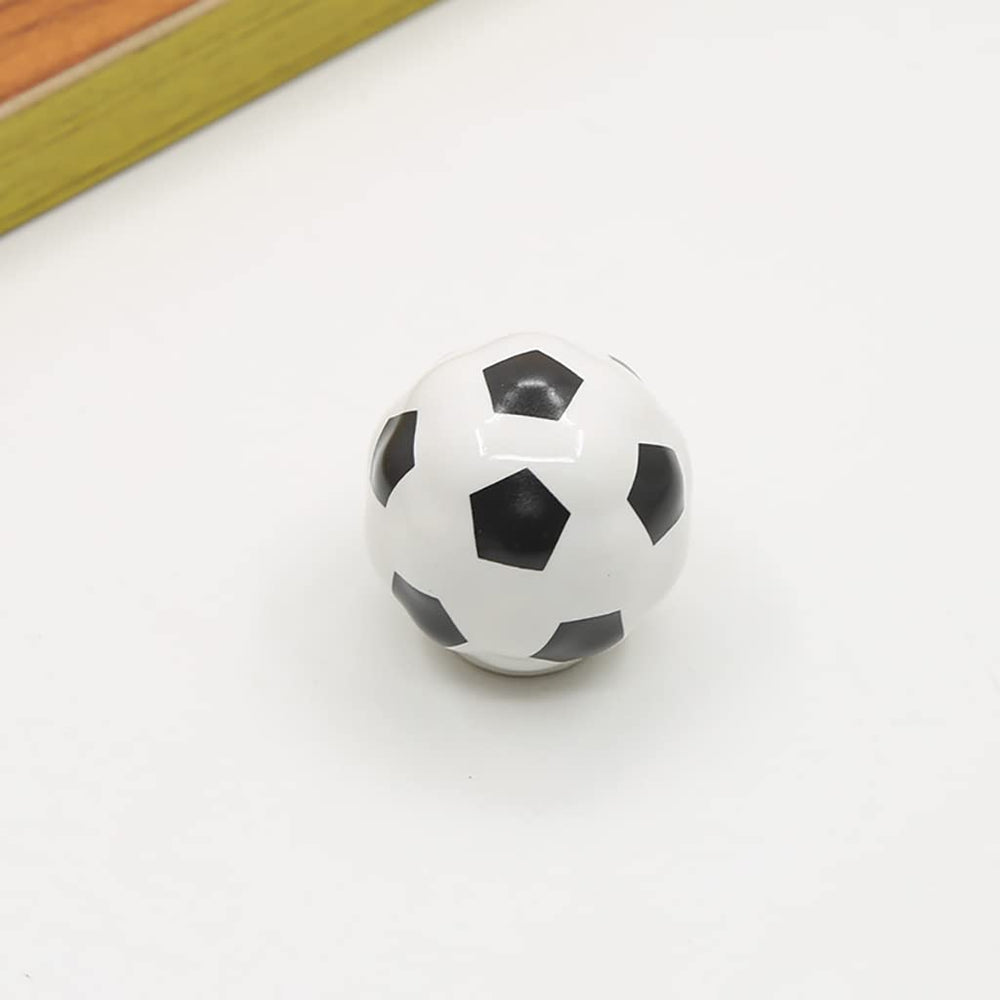 ESreake soccer knob on wood drawer demonstrates quick, tool-friendly installation.