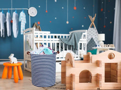 Essme canvas fabric nursery hamper with waterproof coating protects floors and surfaces.