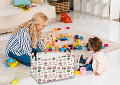 Essme collapsible storage basket in pink aids clutter-free playrooms and laundry areas.