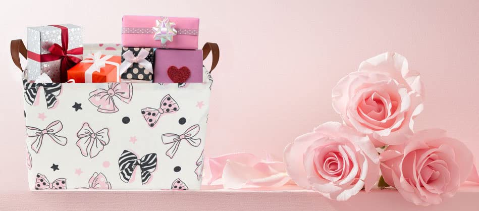 Essme pink rectangular basket in collapsed position demonstrates space-saving storage design.