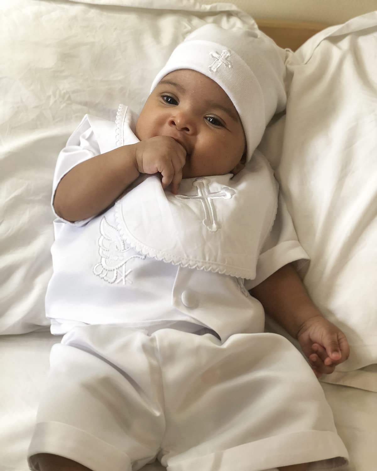 ESTAMICO infant christening bib complements outfits while serving as a thoughtful new-baby gift.