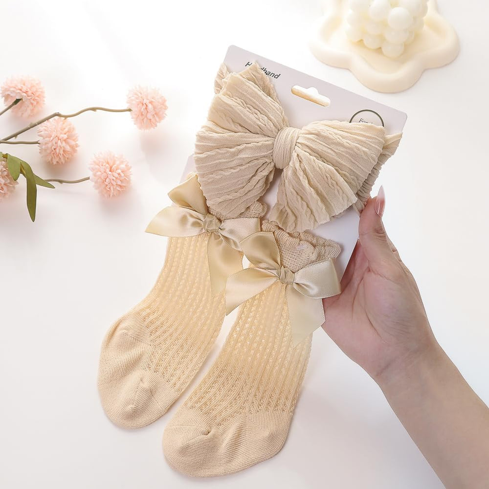 Esumun baptism-ready outfit idea featuring socks and headband.