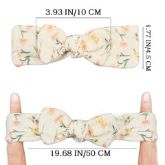 Esumun floral solid headwrap shown with stylish design for outfits and photos.
