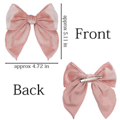 Esumun velvet bow with alligator clips secure grip for active toddlers.