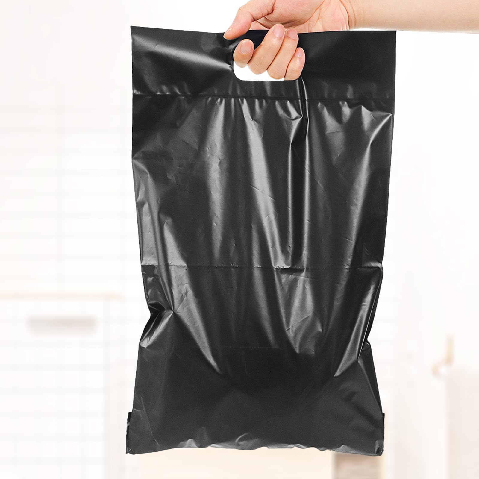 Etenpo top-handled design simplifies carrying to the waste bin.