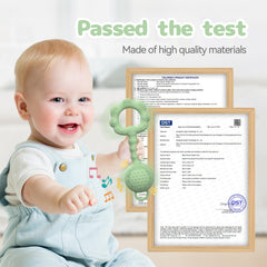 ETETOO teether-rattle green baby holding highlights easy-grip design for tiny hands.
