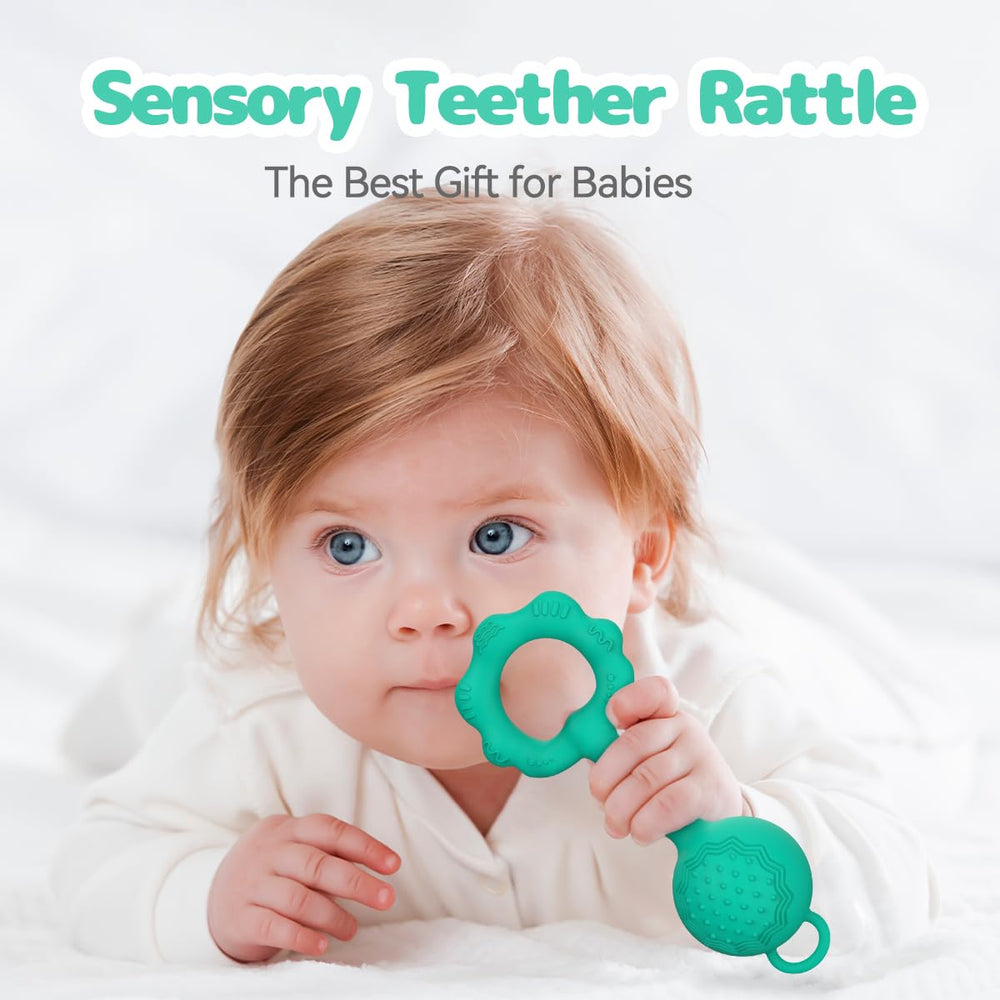 ETETOO spearmint silicone teether with textured surfaces for soothing gums.
