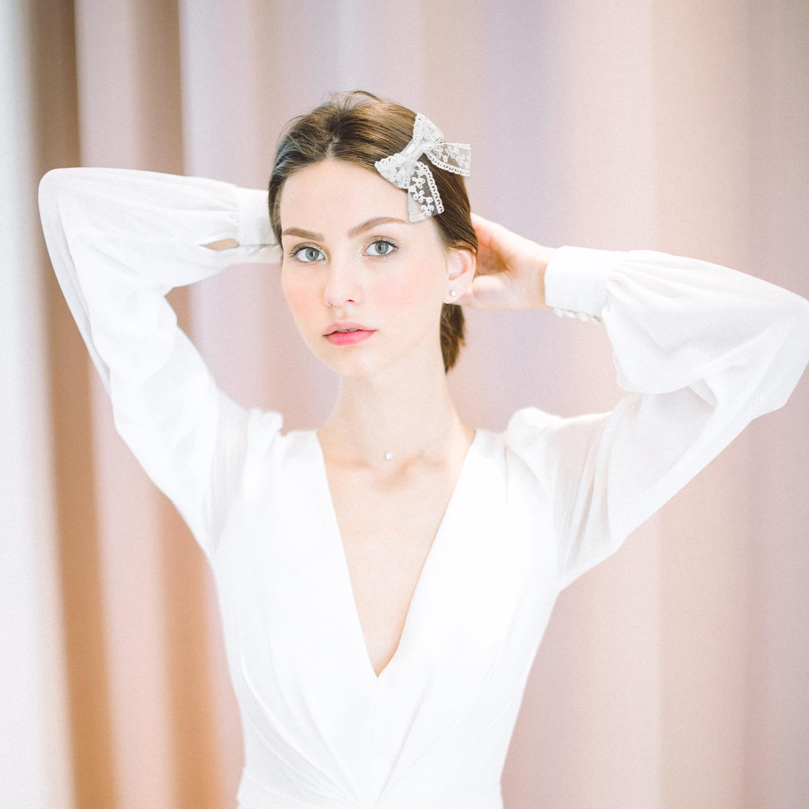 EupHHonycs white lace bow hairpin worn for school or events.