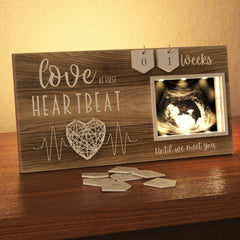EURSET LED illuminated sonogram frame with soft glow showcases ultrasound photo for a warm nursery ambiance.