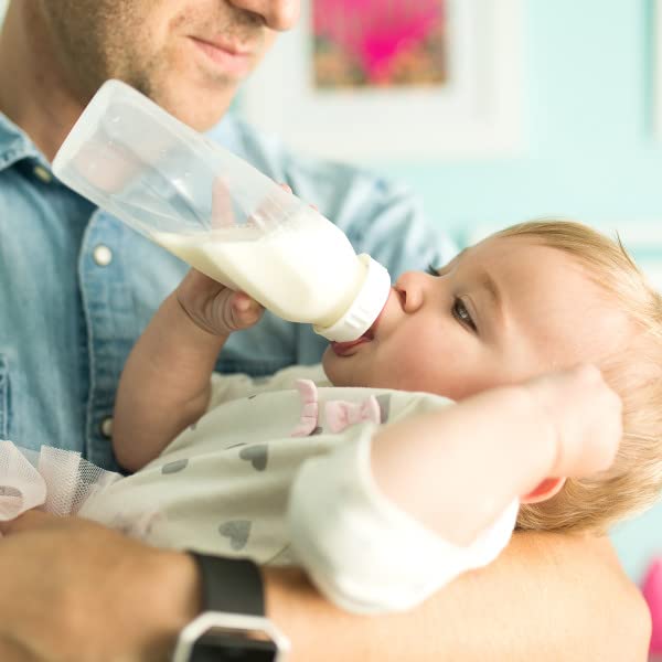 Evenflo Classic bottle-glass assembly demonstrates quick, clean nipple installation