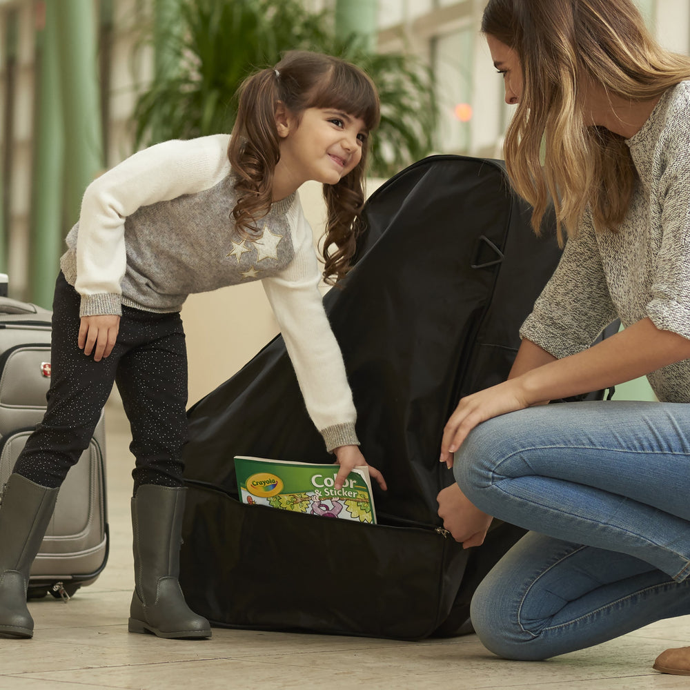 Evenflo car seat travel bag side-pocket adds space for essentials.
