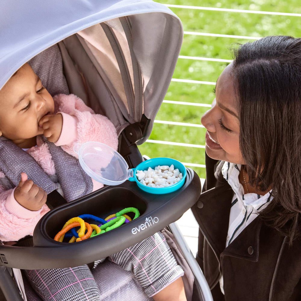 Evenflo stroller snack tray top-rack dishwasher-safe for cleanup.
