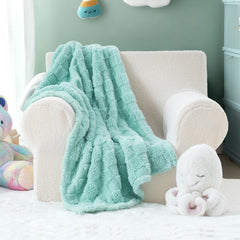 EverGraceHome checkered blanket sits elegantly on a couch for home comfort.