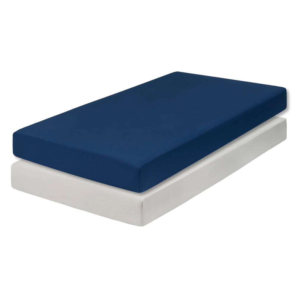 Everyday Kids 2-pack displayed on mattress to show deep pockets and fit.