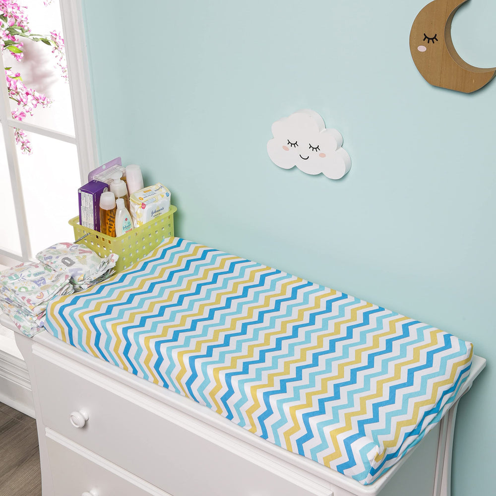 EVERYDAY KIDS fitted design keeps mats secure with elastic edges for a snug diaper-change experience.