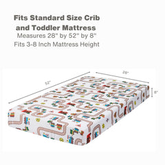 Everyday Kids choo choo train crib sheet on bed demonstrates easy-care setup.