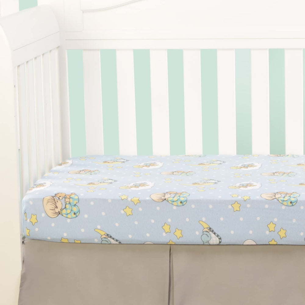 Everyday Kids crib sheet with elastic edge ensures a snug, secure fit on standard mattresses.