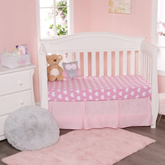Everyday Kids elastic-band closeup shows secure fit on a standard crib mattress
